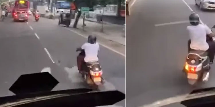 റോഡിൽ സ്കൂട്ടർ യാത്രികന്റെ അഭ്യാസപ്രകടനം: പൊലീസ് കേസെടുത്തു; ലൈസൻസ് സസ്‌പെൻഡ് ചെയ്യും