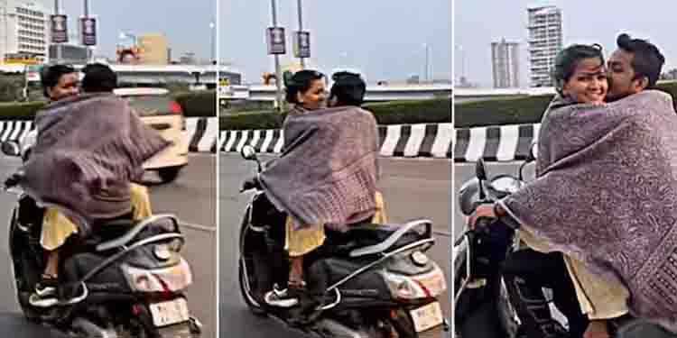 സ്‌കൂട്ടറില്‍ സഞ്ചരിക്കുന്നതിനിടെ ചുംബനം: നടപടി വേണമെന്ന് എംവിഡിയോട് സോഷ്യൽമീഡിയ