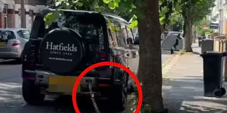 കള്ളന്മാരെ കൊണ്ട് തോറ്റു; ലണ്ടനില്‍ മരത്തില്‍ ചങ്ങലയ്ക്കിട്ടിരിക്കുന്ന ലാന്‍ഡ് റോവറിന്‍റെ വീഡിയോ വൈറല്‍